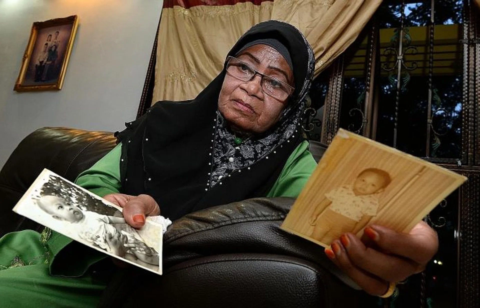 GRIEVING: (Above) Madam Daliah still breaks down whenever she talks about Ghazali.