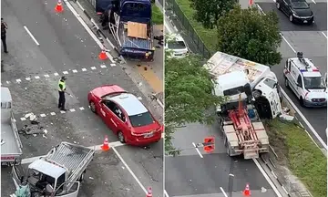 Motorcyclist killed in 7-vehicle accident in Woodlands Road; truck driver arrested