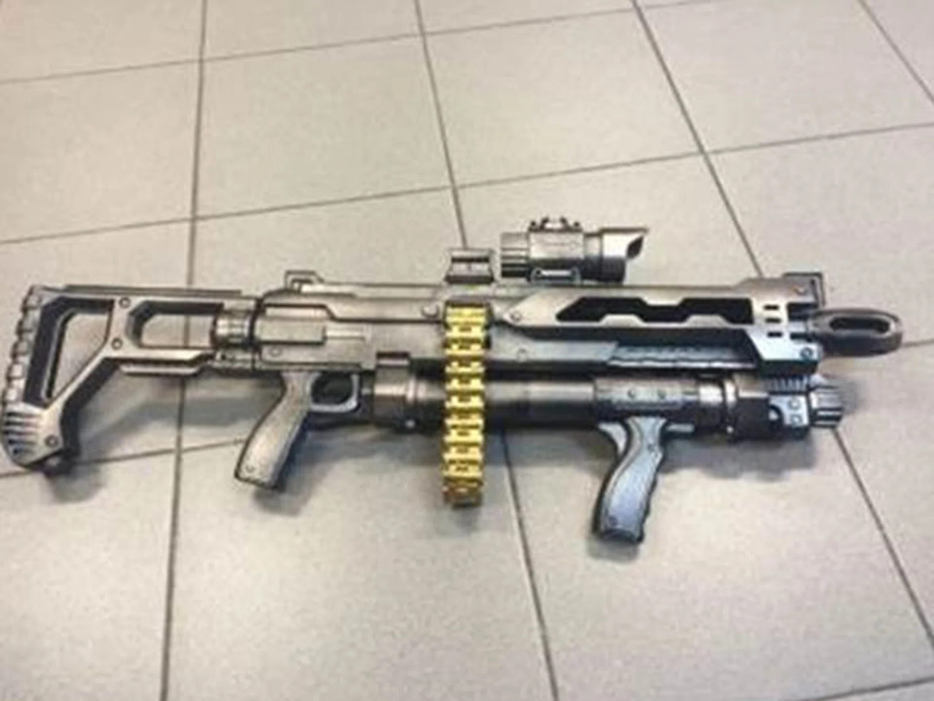 A 21-year-old man was arrested for causing public alarm with a realistic-looking toy gun.