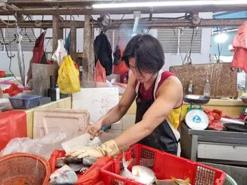 Hook, line & third-generation: Man, 21, foregoes university to take over dad's fishmonger business
