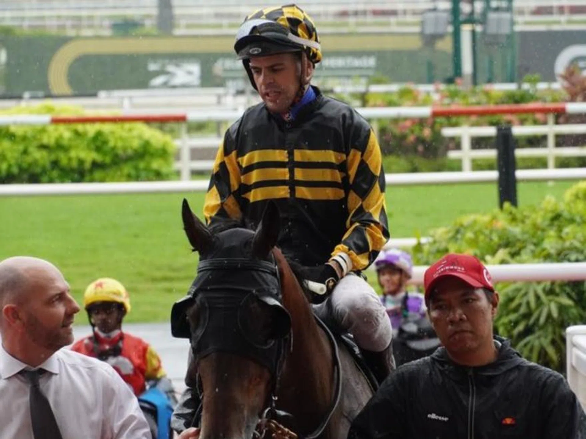 Trainer Tim Fitzsimmons enjoying a moment with winning jockey Ruan Maia, who steered newcomer Tommy Gun to an easy victory in the Restricted Maiden 1,200m event on the long course in yielding going at Kranji on May 4.
