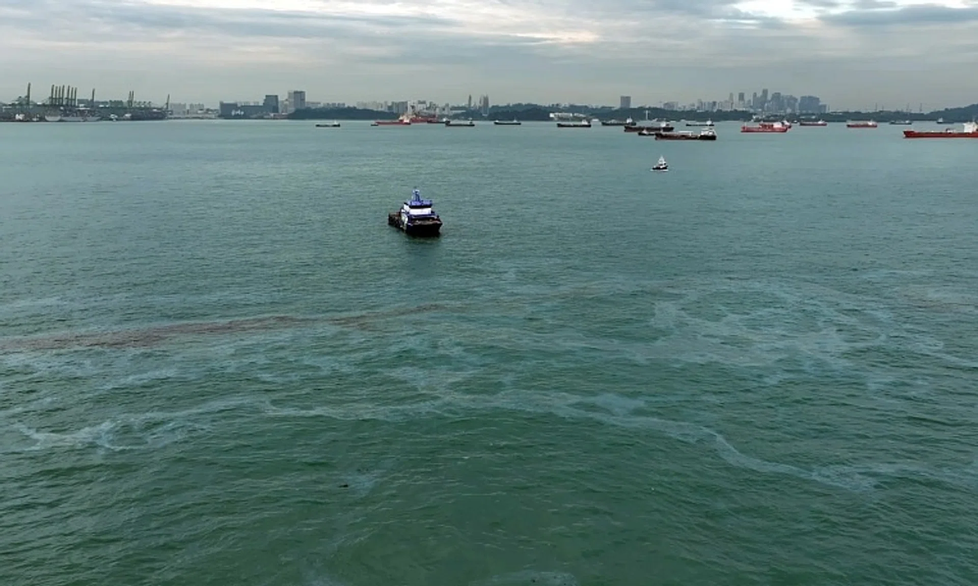 The oil was leaked into the sea from a land-based pipeline belonging to Shell between Bukom Island and Bukom Kecil.