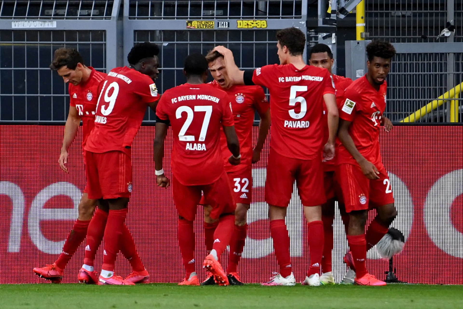 Joshua Kimmich's (centre) winner gives Bayern Munich a seven-point cushion at the top of the Bundesliga with six matches left. 