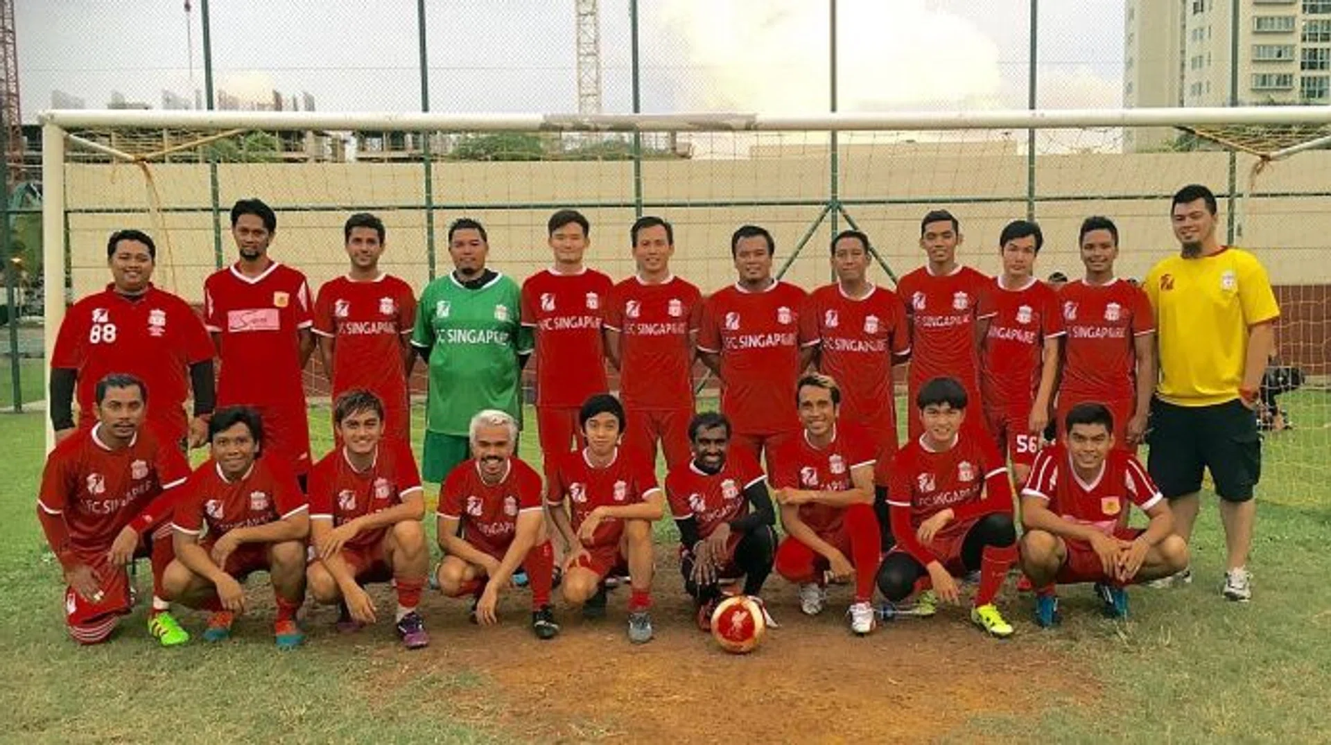 SUPPORT: (Above) Members of the Liverpool FC Official Supporters Club Singapore.