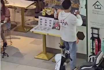 Able-bodied man rides PMA to pick up order at foodcourt