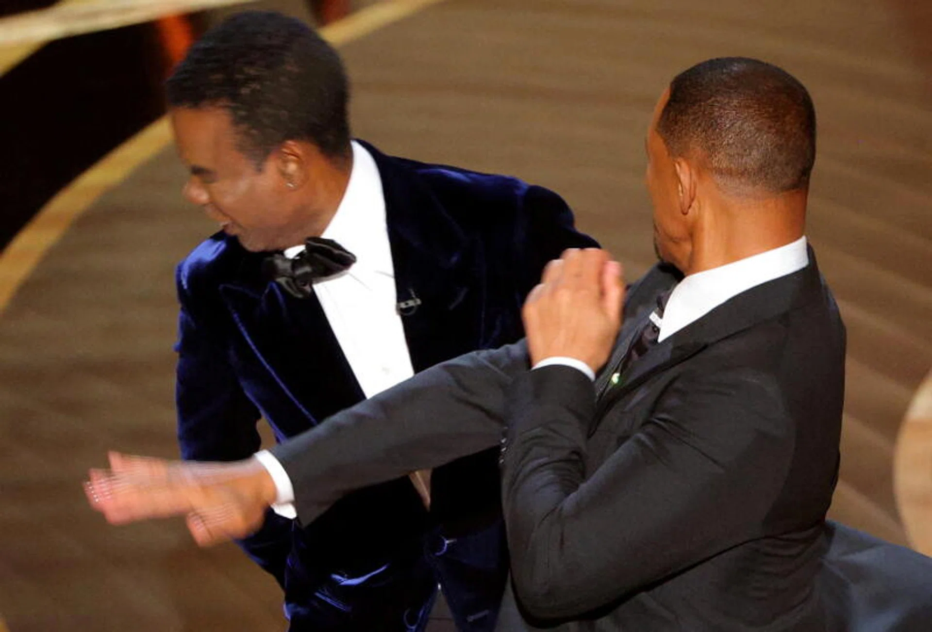 US actor Will Smith refused to leave the Oscars ceremony after attacking comedian Chris Rock, the Academy said as it began disciplinary action against the mega star.