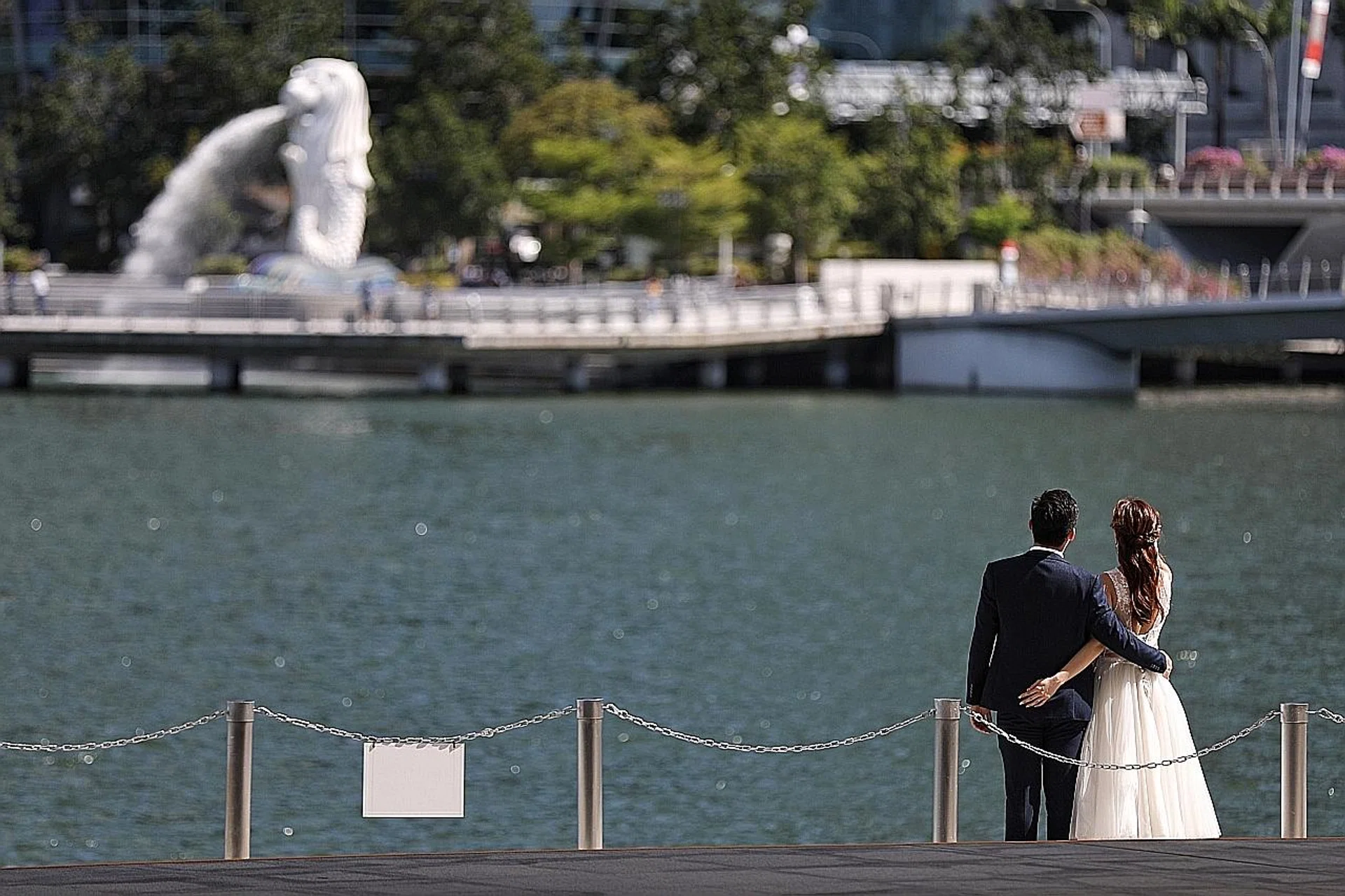 The eased restrictions include allowing up to 100 people, including the bride and groom, to attend wedding receptions in venues that are permitted to serve food and drinks from Oct 3.  