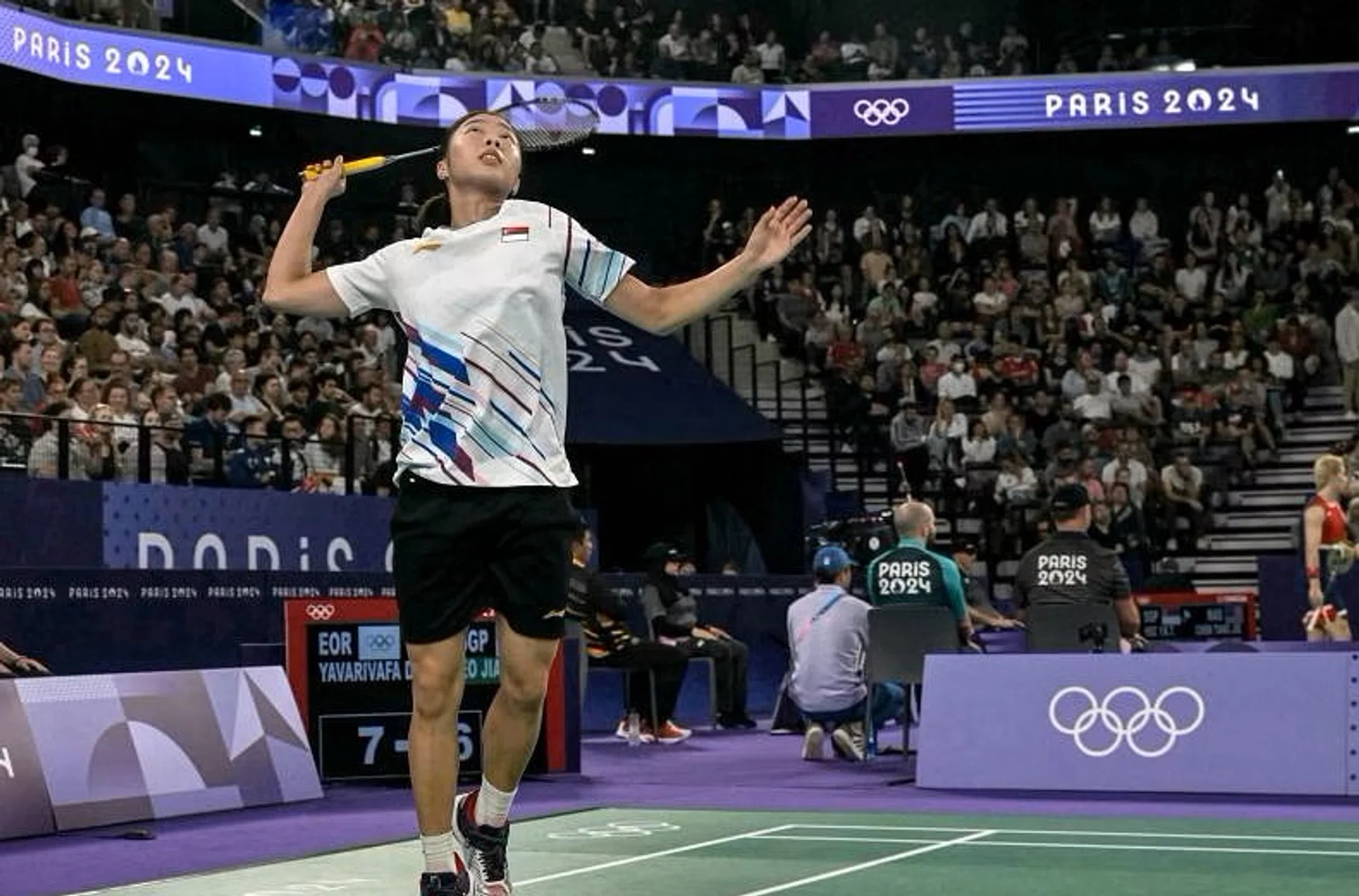 Singapore's Yeo Jia Min in action against  Dorsa Yavarivafa of the Olympic Refugee team in the badminton women's singles Group I.