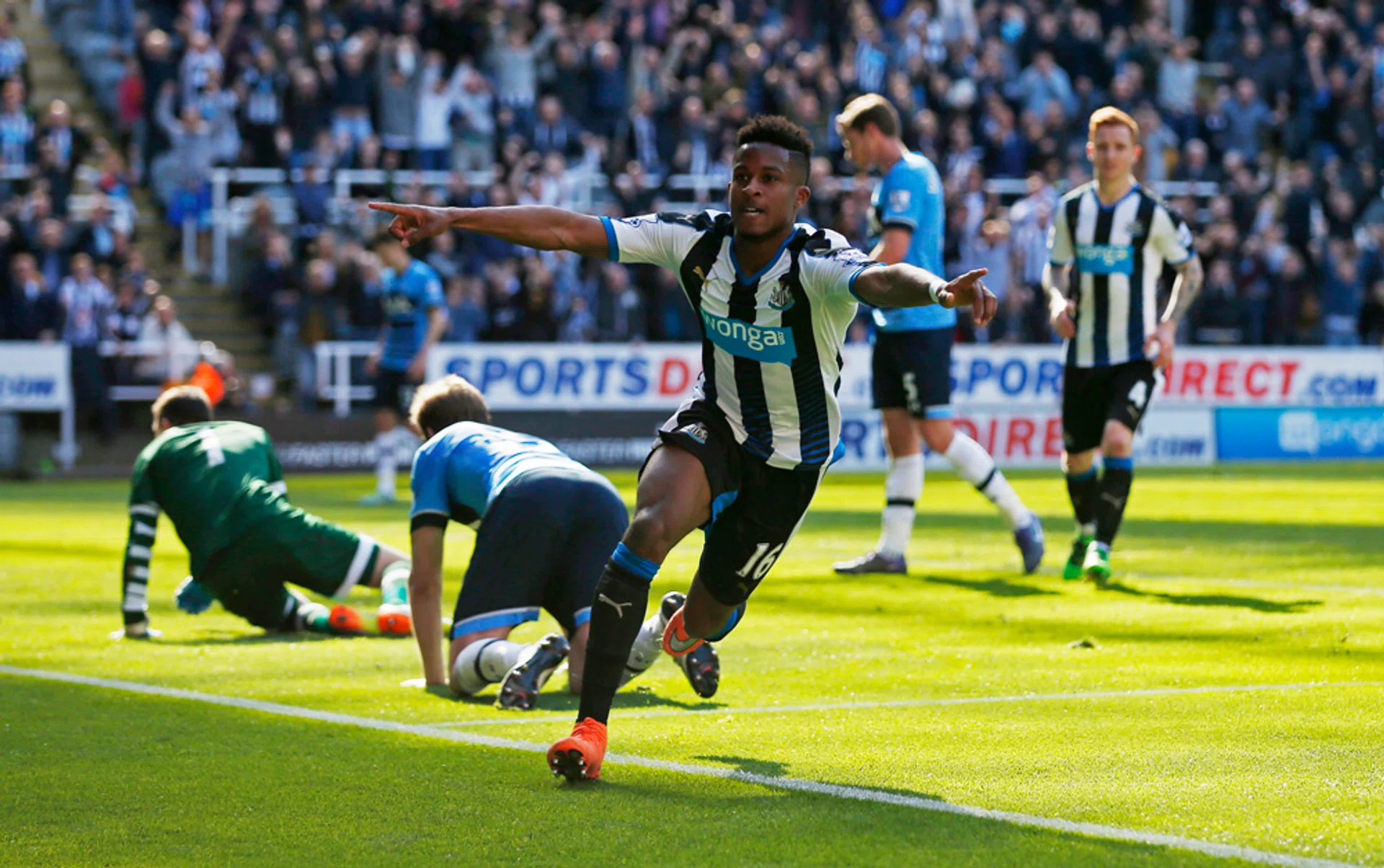 Rolando Aarons celebrates scoring the fourth goal for Newcastle United 