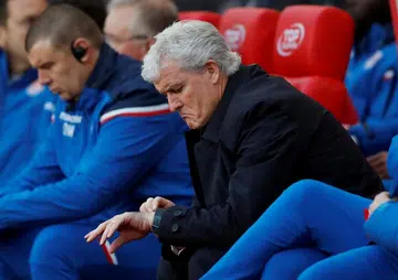 Hughes sacked after Cup exit
