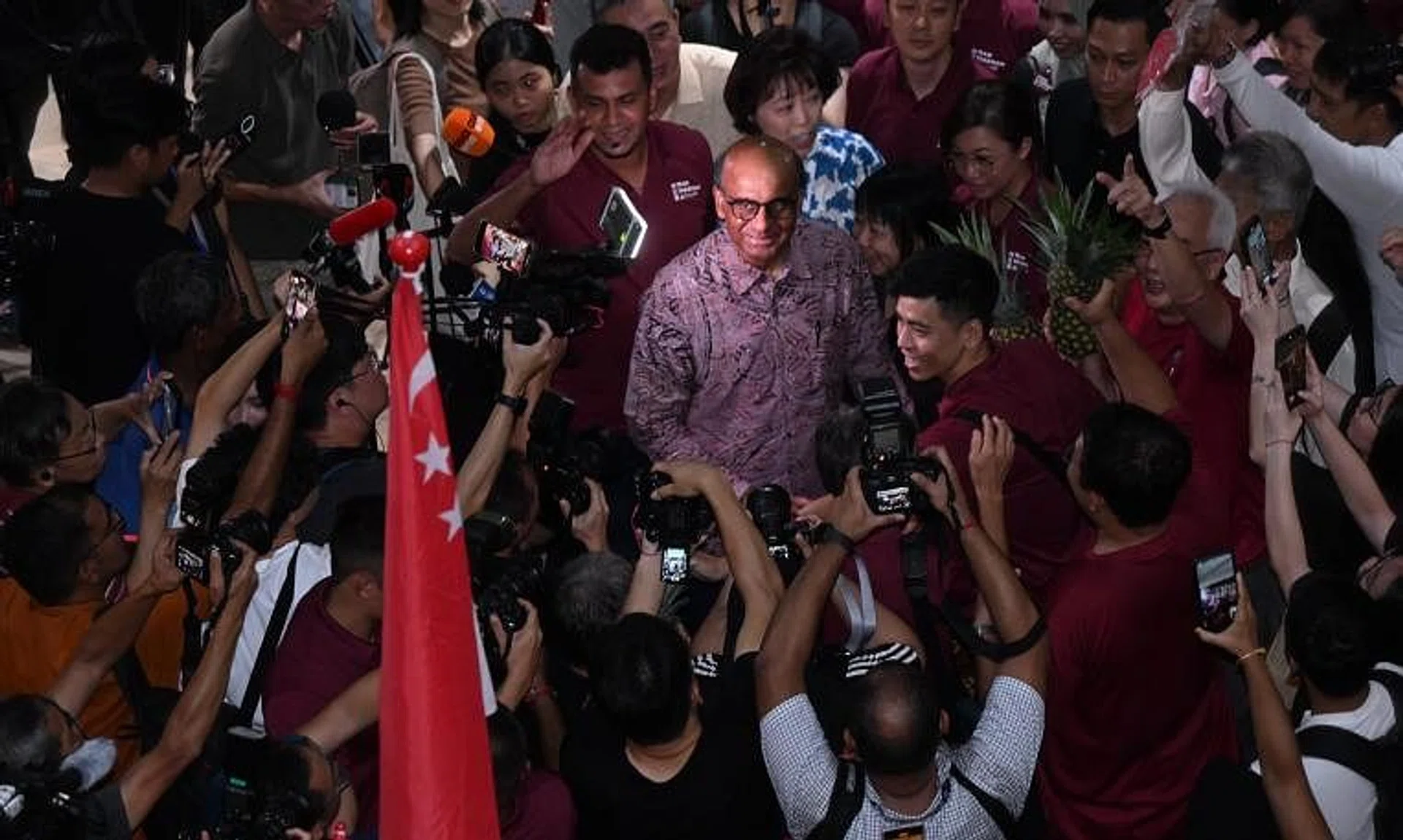 Presidential candidate Tharman Shanmugaratnam greeting his supporters at Taman Jurong Food Centre on Sept 1.