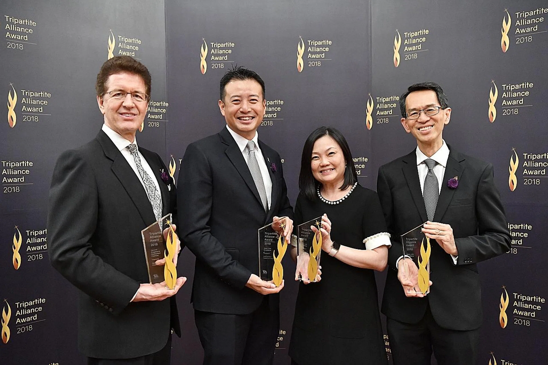 (From left) Mr Christian Hassing, general manager of Mandarin Oriental Singapore; Mr Terence Quek, CEO of Emergenetics Caelan and Sage; Ms Jacinta Low, Head of HR Planning of OCBC Bank; and Justice See Kee Oon, Presiding Judge of State Courts. 