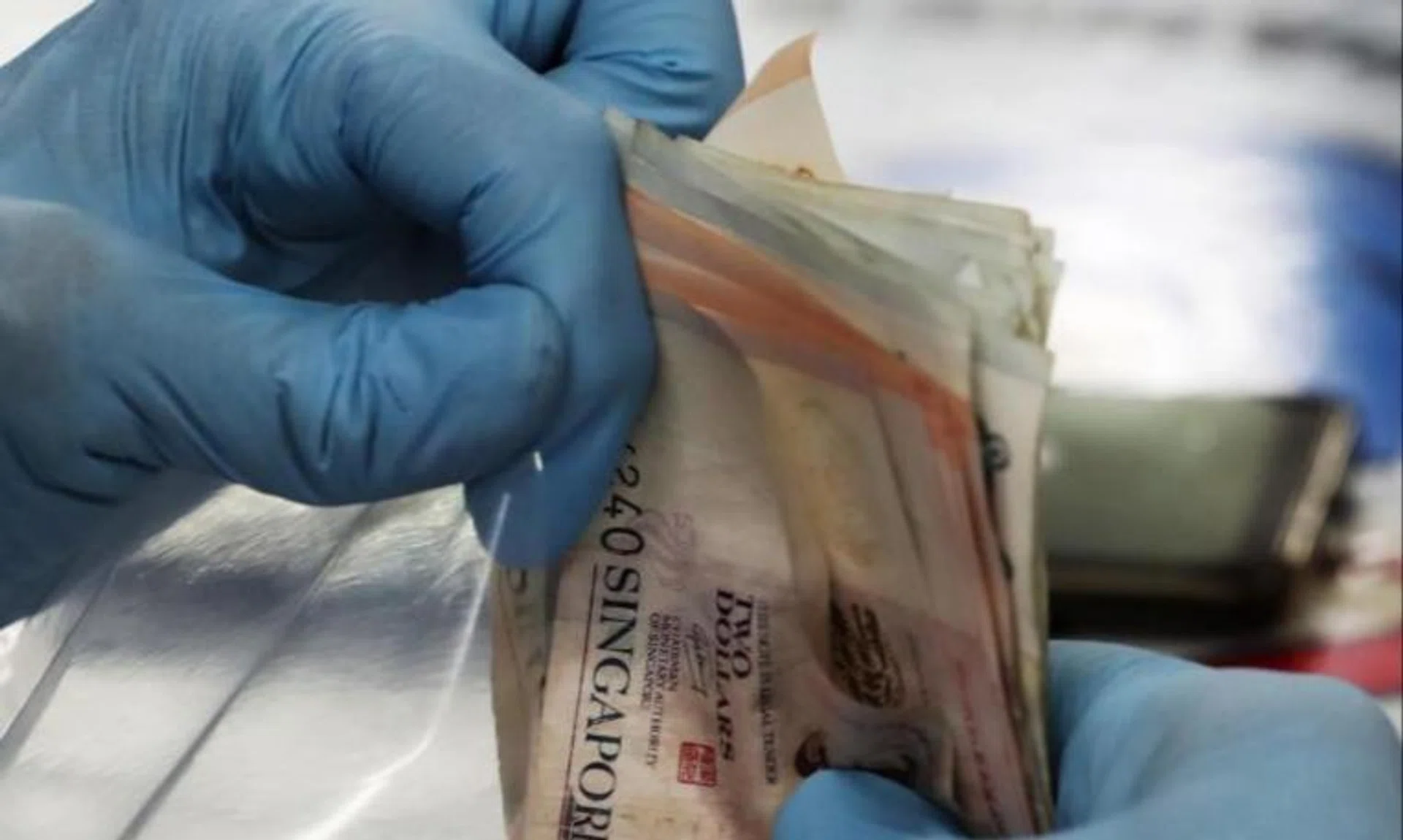 He went on an online shopping portal and searched for “USD dollar note”. He then bought “Singapore toy money” that was displayed.