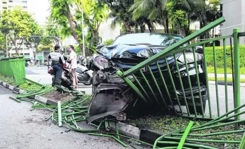 Private-hire car crashes into median railing in Toa Payoh
