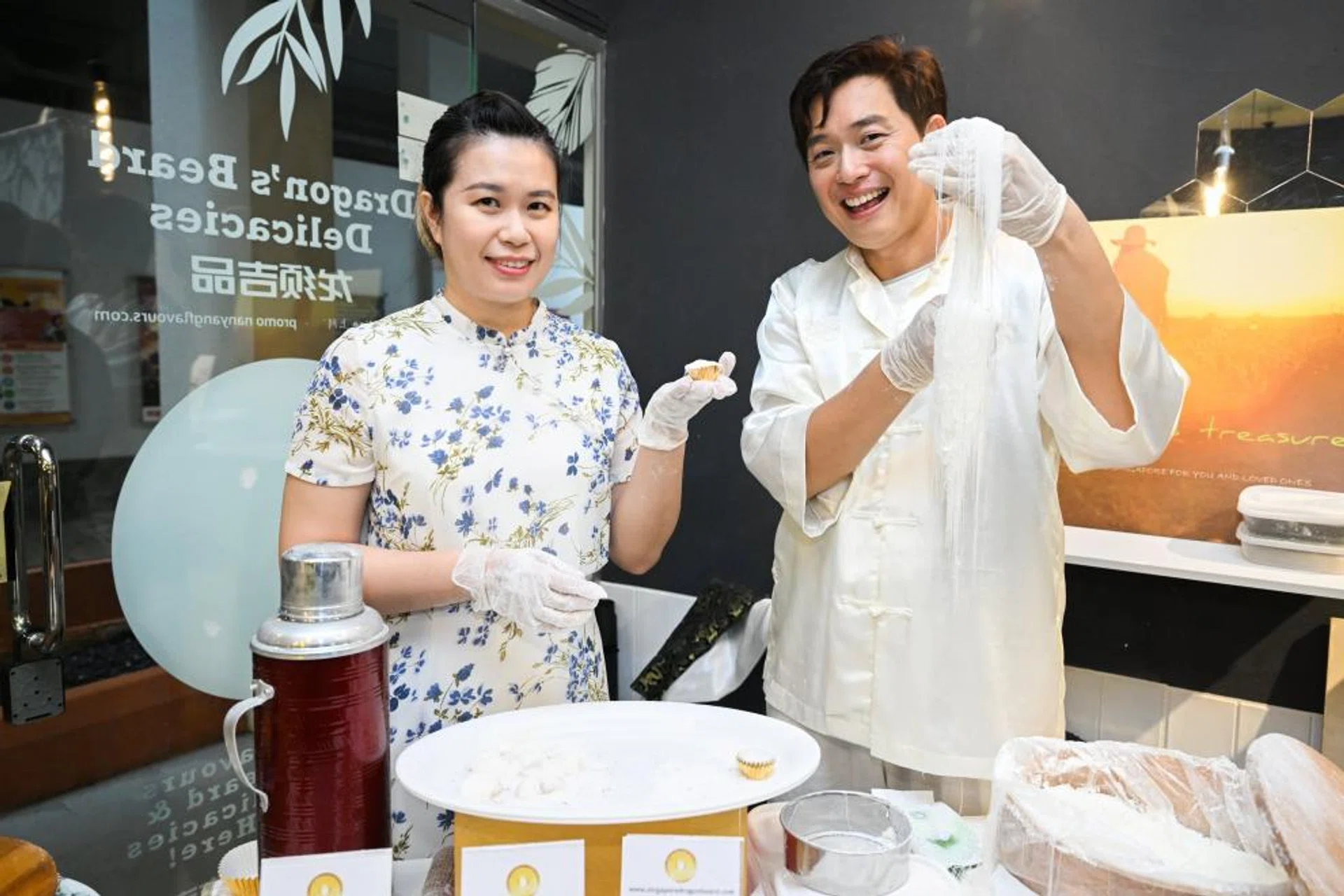 Roger Poon and Elaine Poon learnt the skills of making dragon's beard delicacies from their relative, Lili Ho.