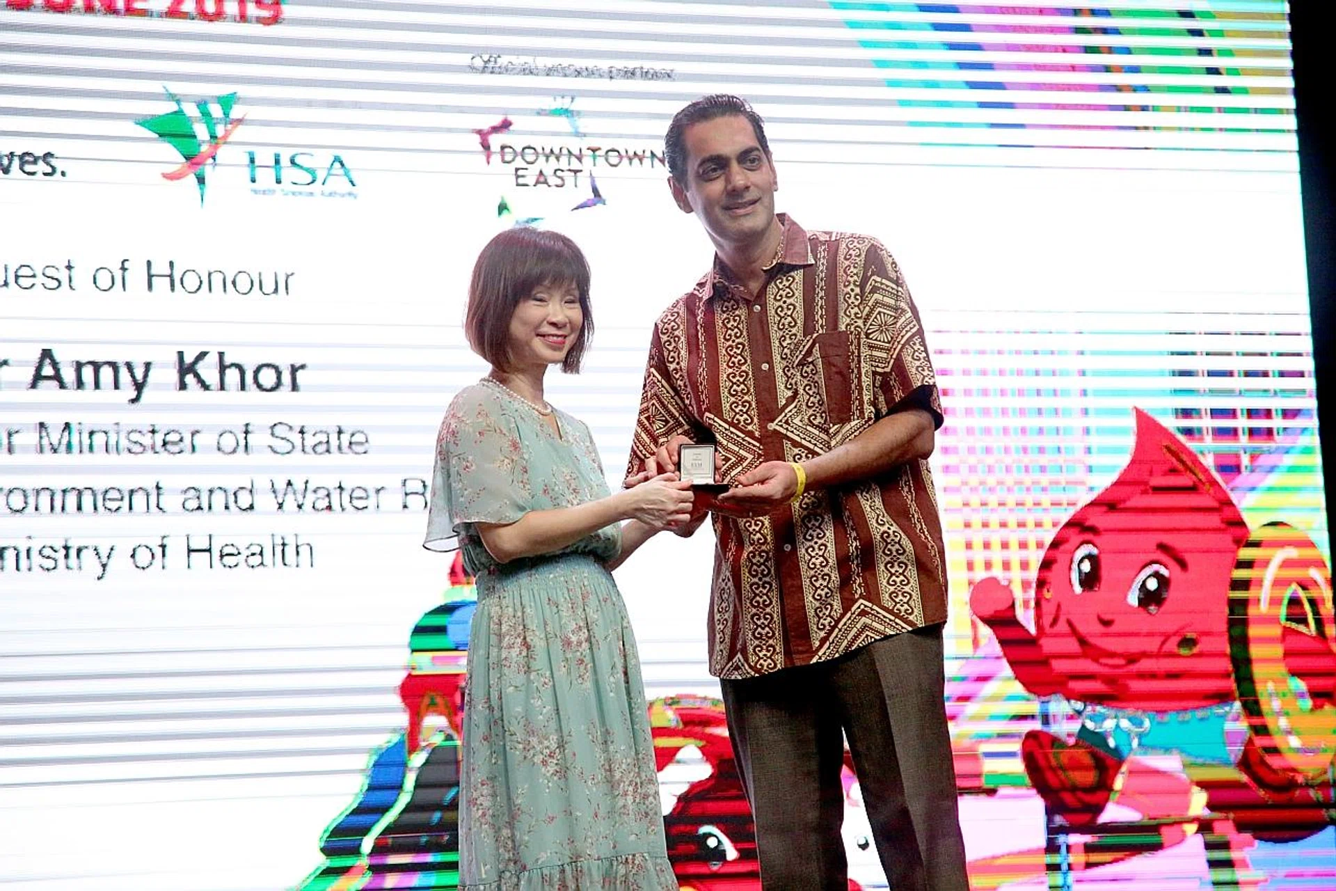 Mr Lakhani Ramchand (right) was crowned the "Champion of Champions" for making over 150 blood donations, while Mr Sean Chan was honoured for making 50 donations. 