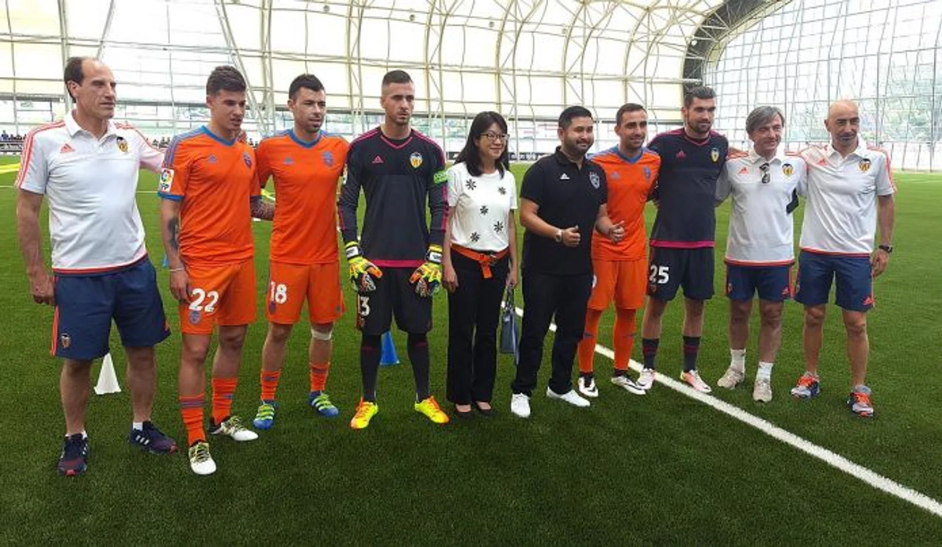 ROYAL WELCOME: Johor Darul Ta'zim (JDT) chairman Tunku Ismail Sultan Ibrahim (showing the thumbs-up) welcoming players and officials of Valencia, including president Chan  Lay Hoon (on his right) at JDT's Padang Seri Gelam training facility yesterday.