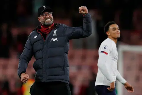 Liverpool seal Christmas No. 1 spot with 3-0 win at Bournemouth