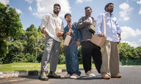 Free makeover by local fashion labels turns migrant workers into models