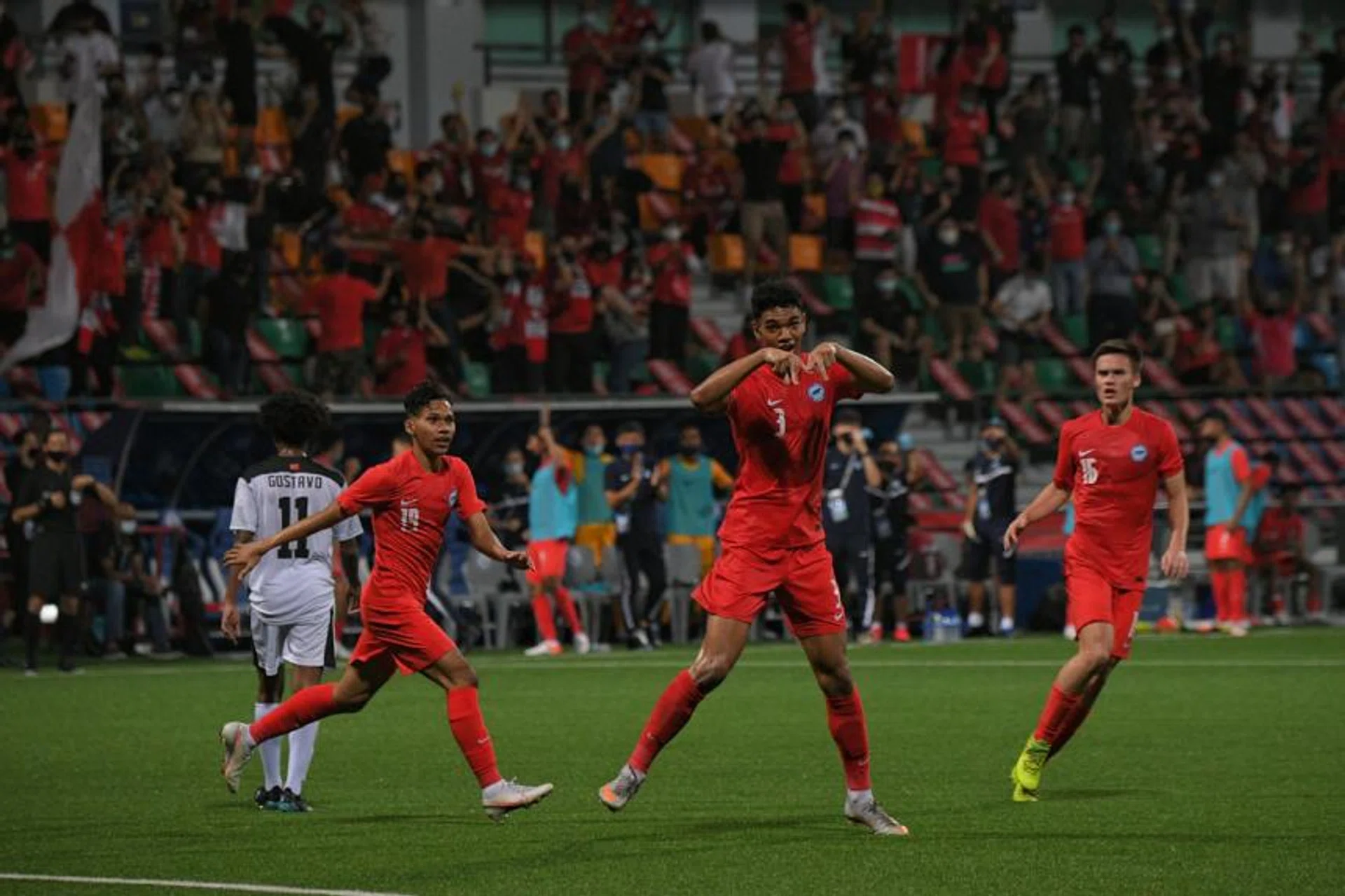 Singapore's Under-23 football team celebrates after equalising against Timor Leste at Jalan Besar Stadium on Oct 25, 2021.