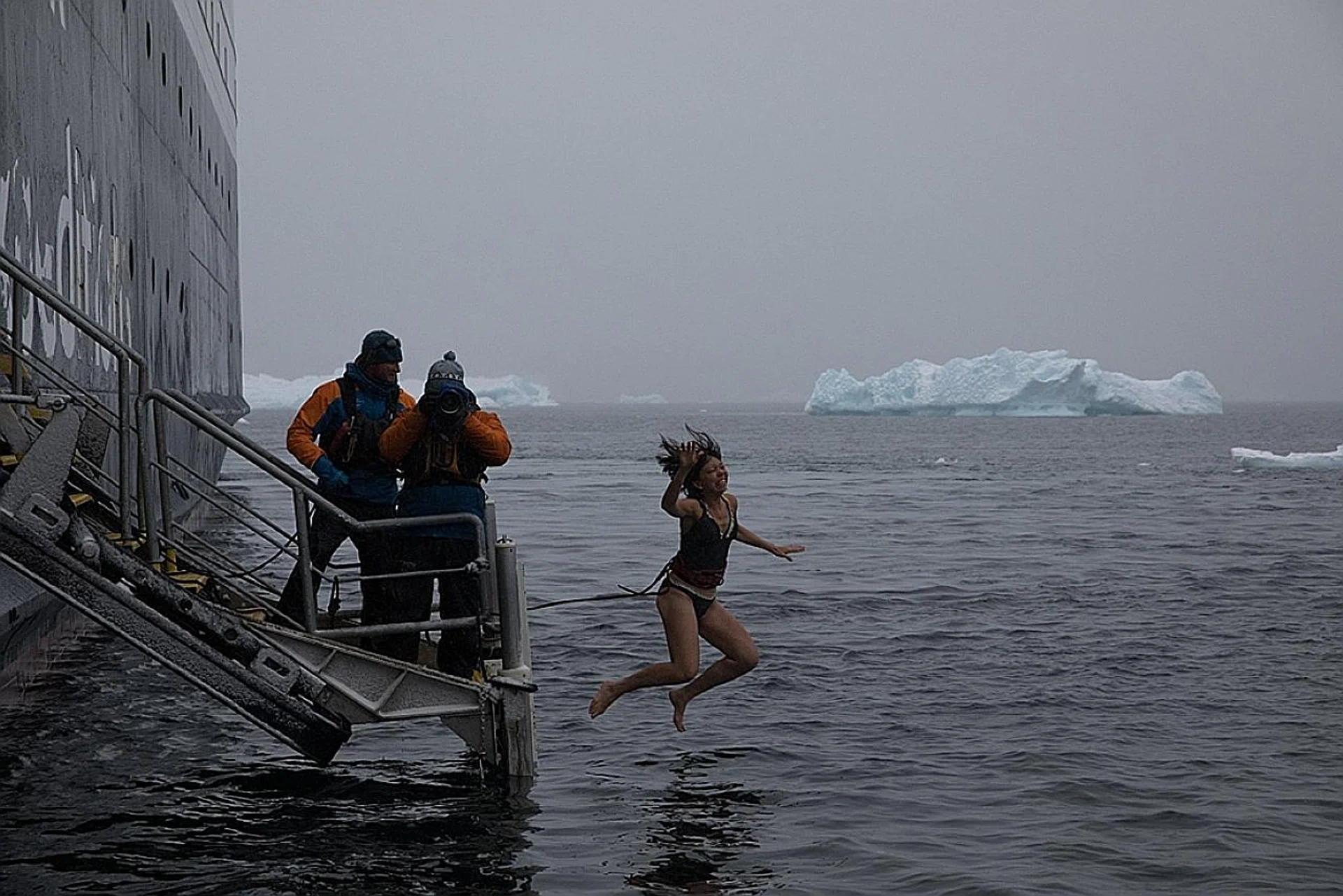 Ms Anthea Ong jumping into the ice-cold waters.