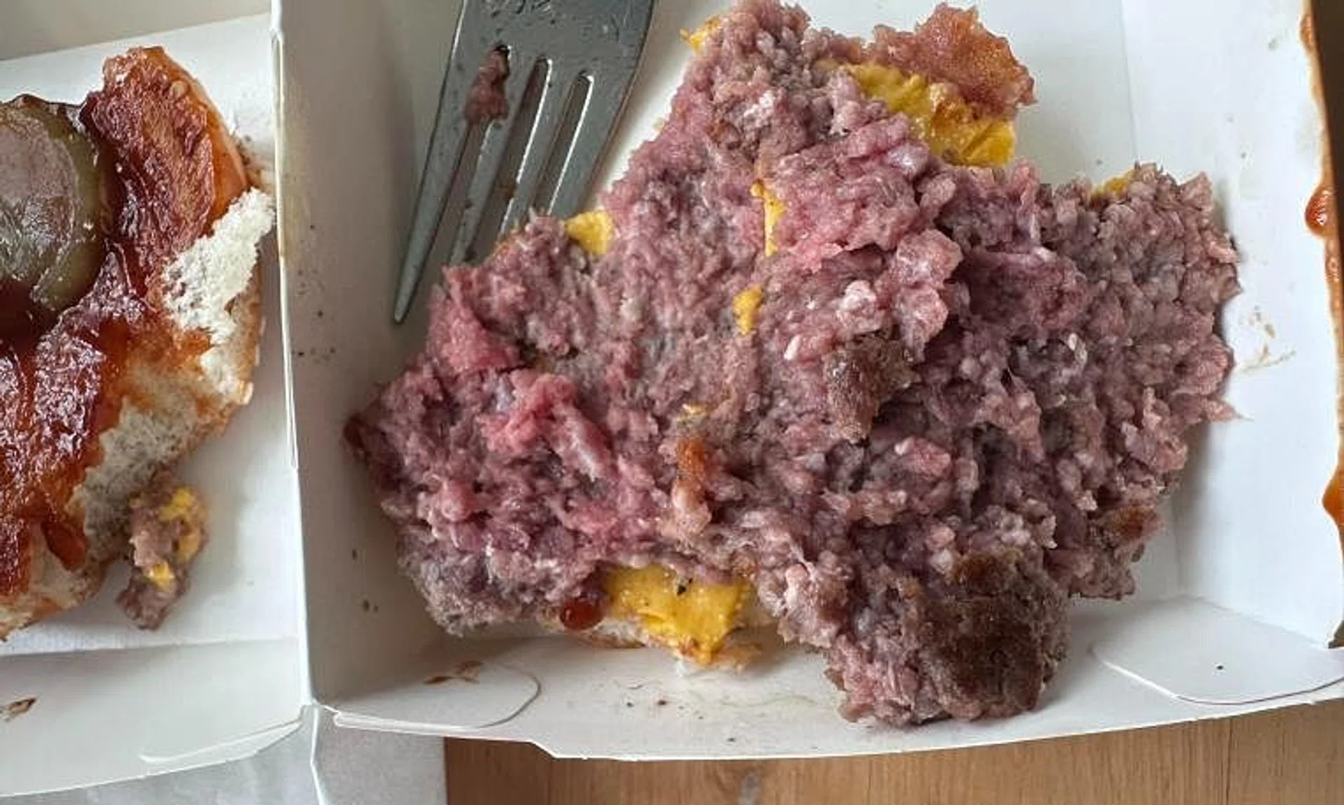 The woman said her burger had what looked like an undercooked beef patty.
