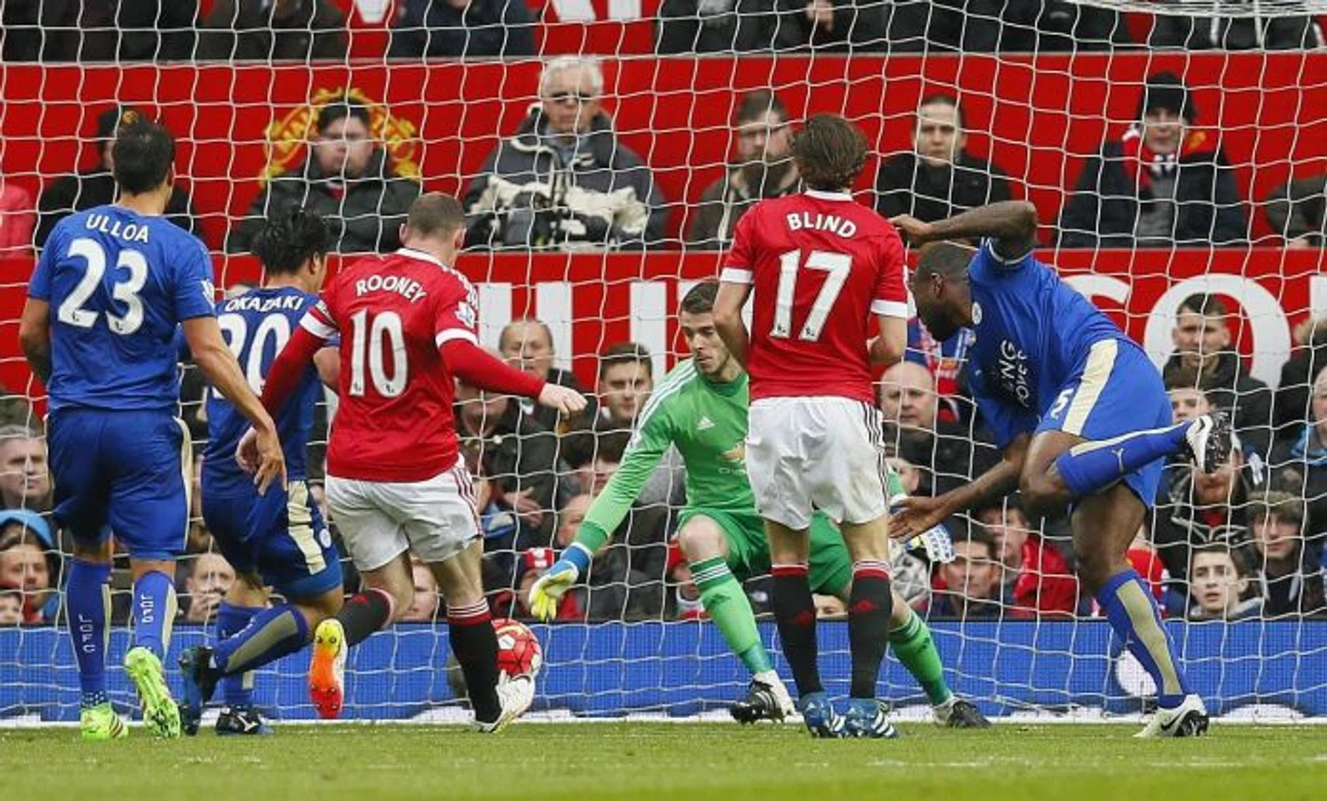 CAPTAIN TO  THE RESCUE: Wes Morgan's (above right) equaliser edges Leicester closer to the EPL title.