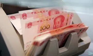 Chinatown shops illegally compare rates for renminbi remittance