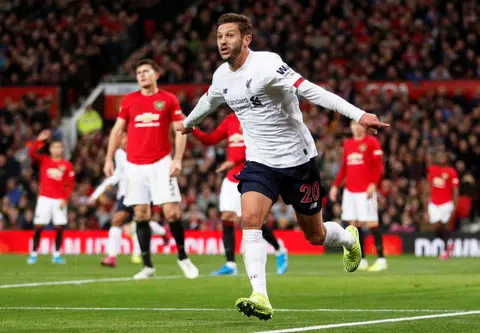 Lallana earns Liverpool a draw at Old Trafford