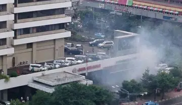 Explosions in Jakarta, gunfire heard