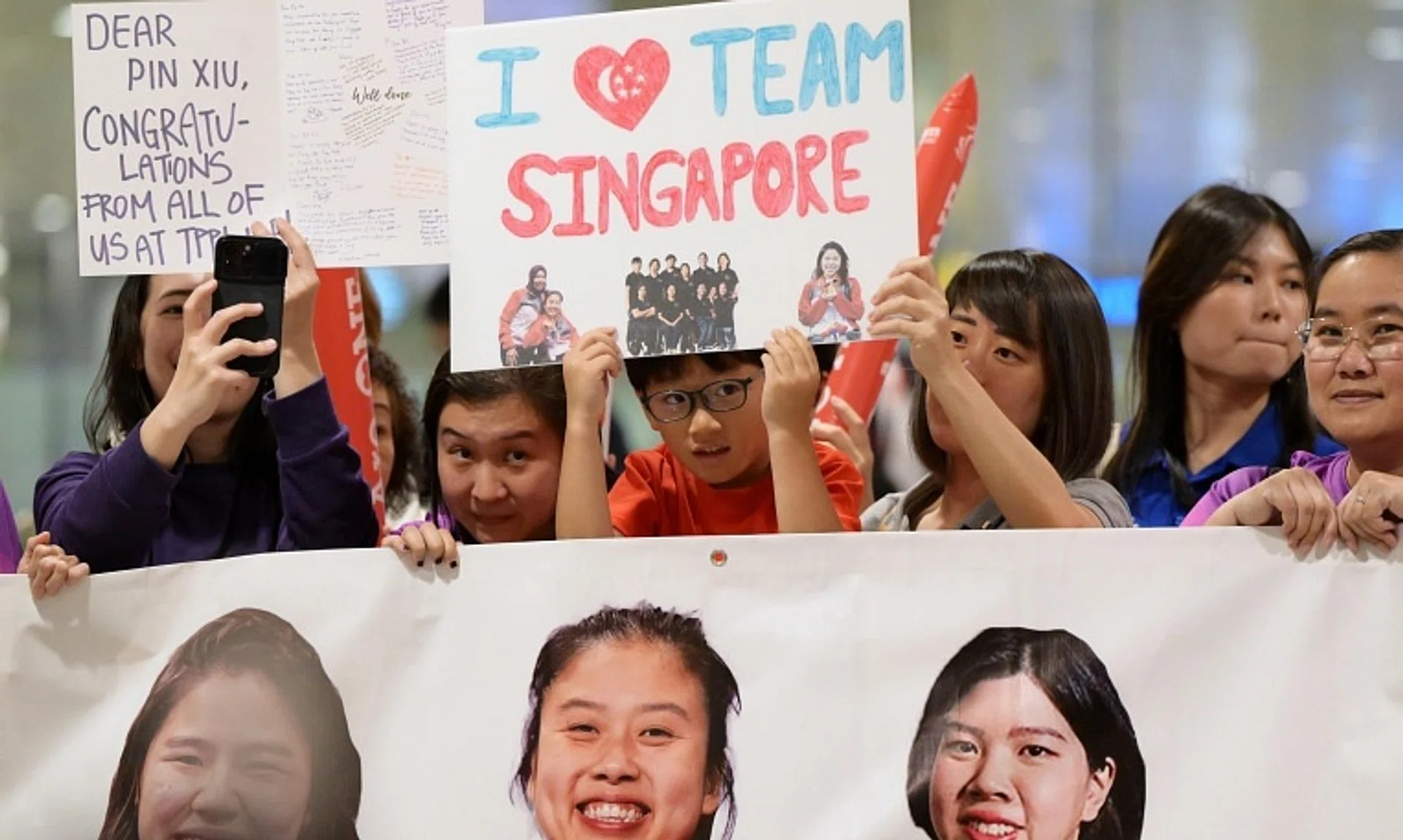 Supporters welcoming Singapore's Paralympians at Changi Airport on Sept 10.