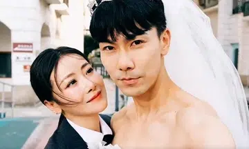 Dai Xiangyu swops wedding finery with wife on 8th anniversary of nuptials