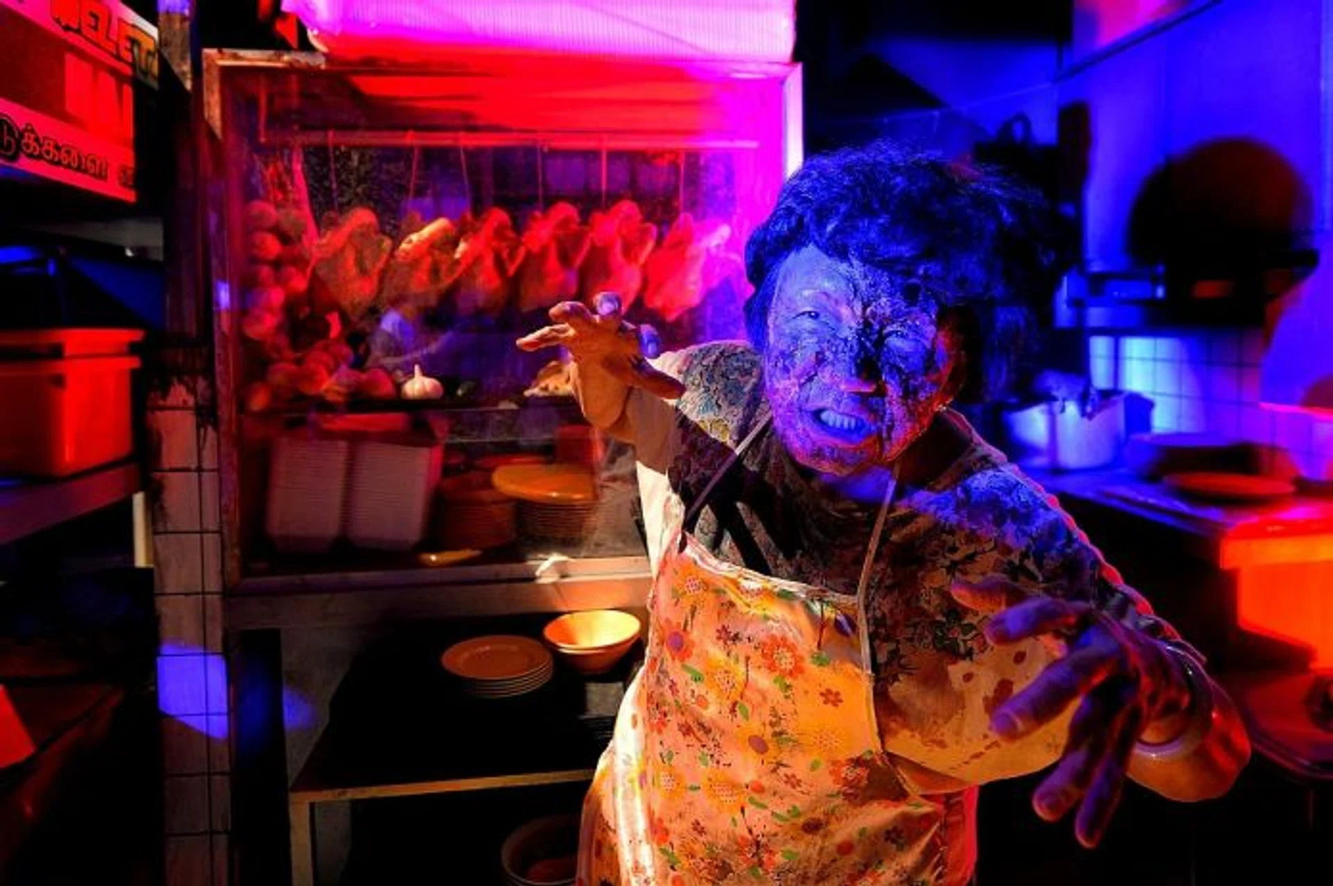 YOU'RE DEAD MEAT: A zombie in front of her chicken rice stall from the Hawker Centre Massacre.