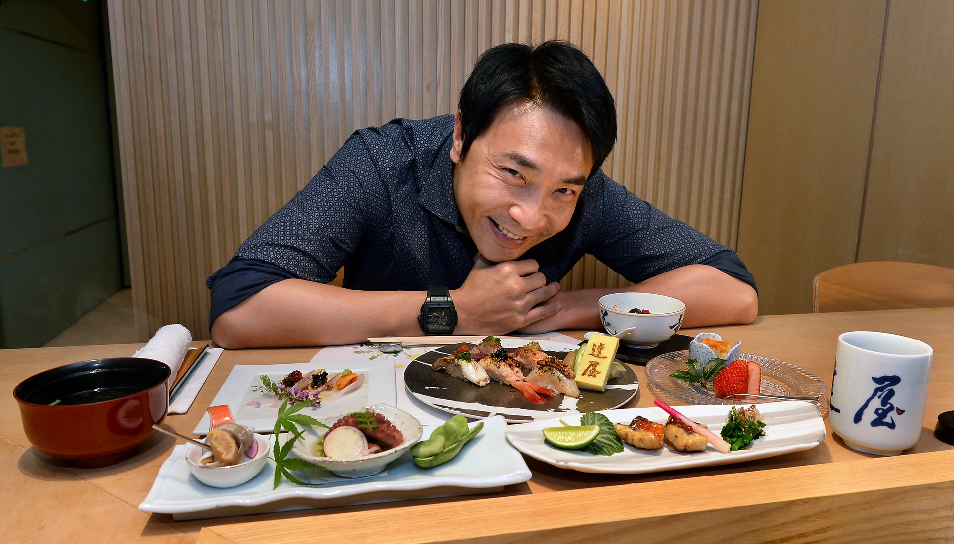GOING JAPANESE: (Above) Tay Ping Hui with his favourite Japanese fare at Tatsuya in Goodwood Park Hotel.