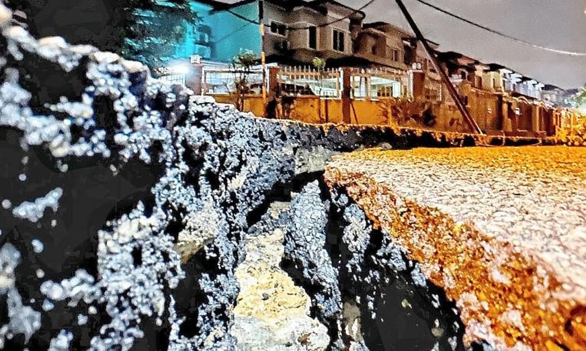 The occupants of nine houses closest to the sinkhole were forced to evacuate through the back door after the authorities declared the area unsafe. 