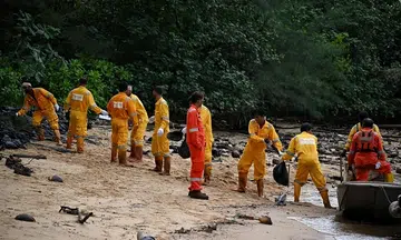 Unsung heroes in Singapore toil daily for over 2 months