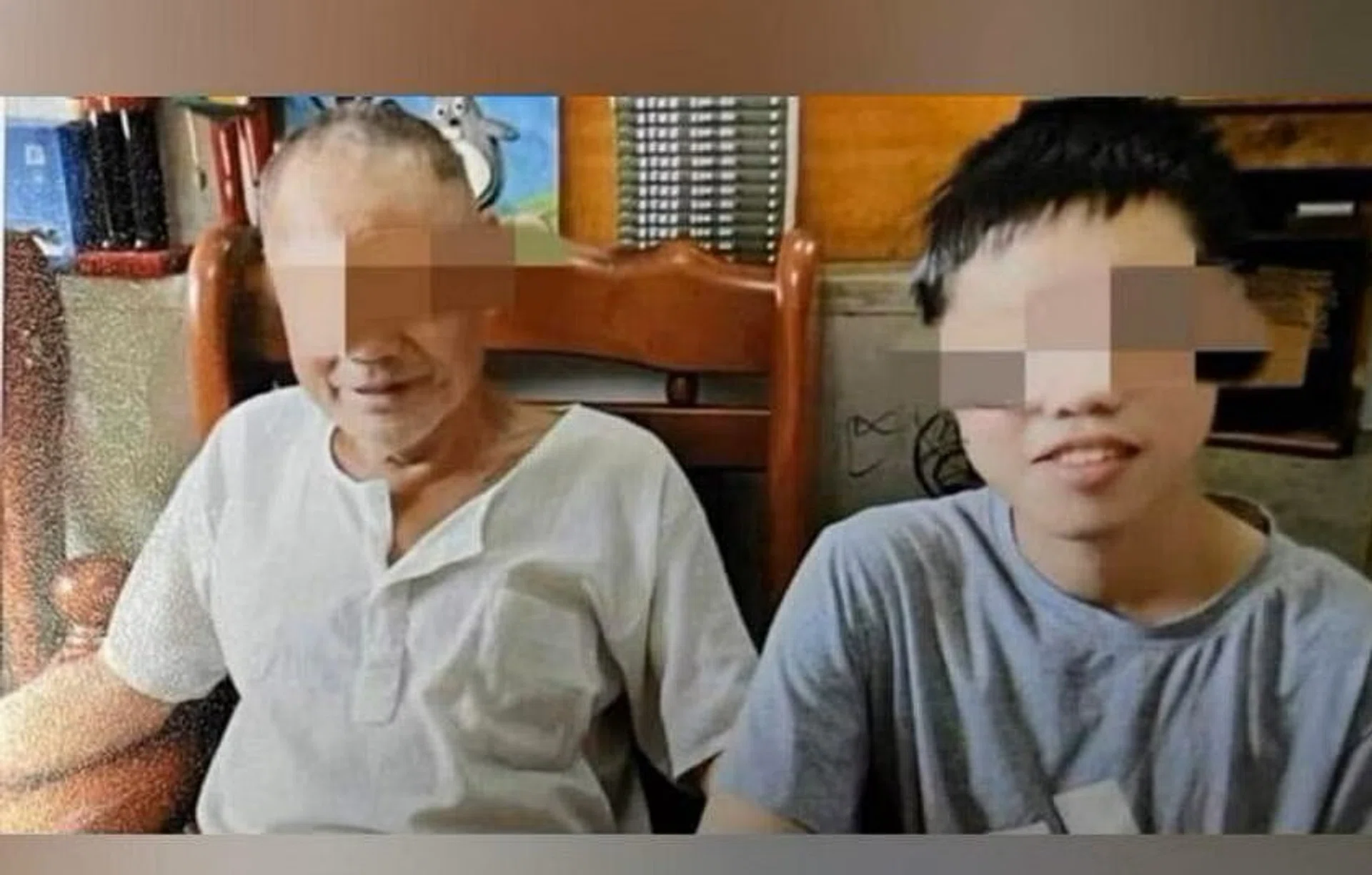 A photo, widely used online, purportedly of Mr Lai (right) and his father. The younger man was found dead after falling off a building in Taichung's Beitun district.
