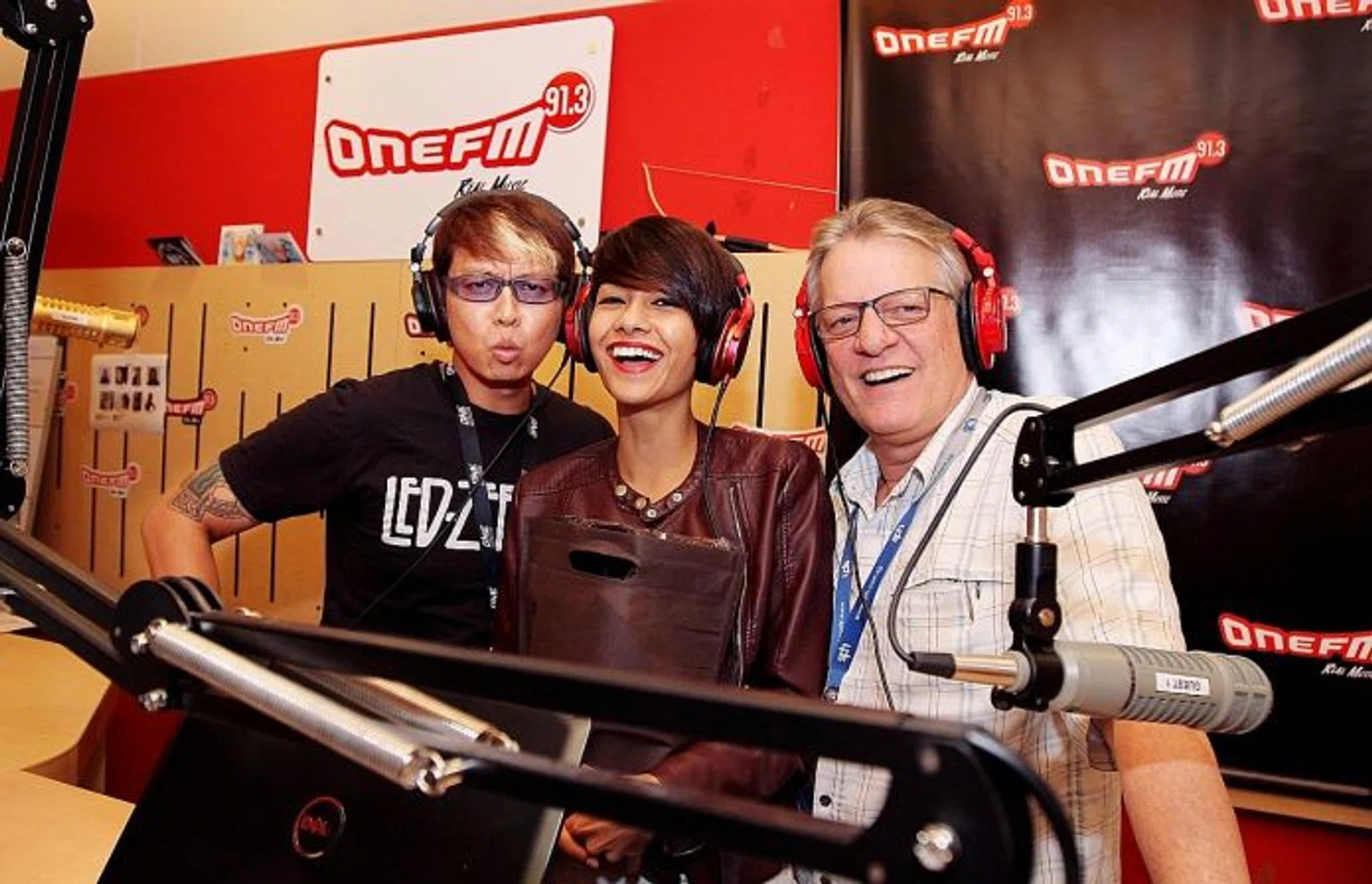 STUDIO STINT: New Face 2015 winner Selynna Norhisham with ONE FM's #1 Breakfast Show DJs Glenn Ong and The Flying Dutchman.