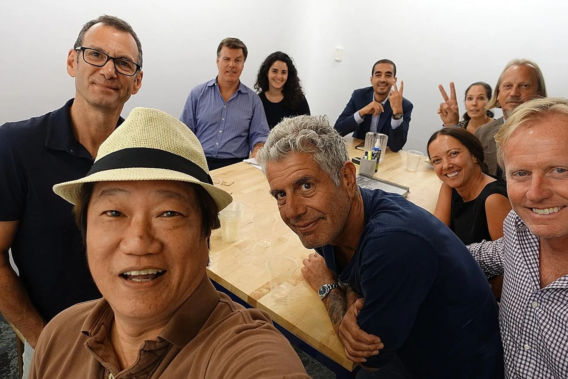 K.F. Seetoh (left, foreground) with Anthony Bourdain (centre). 
