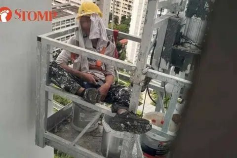 Painter sleeping in suspended gondola outside McNair Towers alarms resident