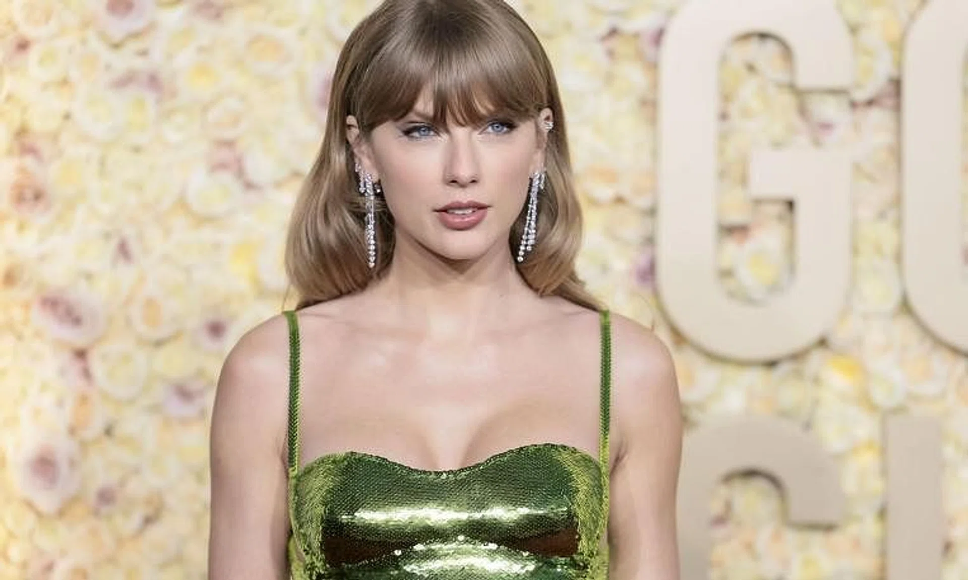 A NY Times opinion piece suggests Taylor Swift is sending veiled signals to her fans that she is queer.