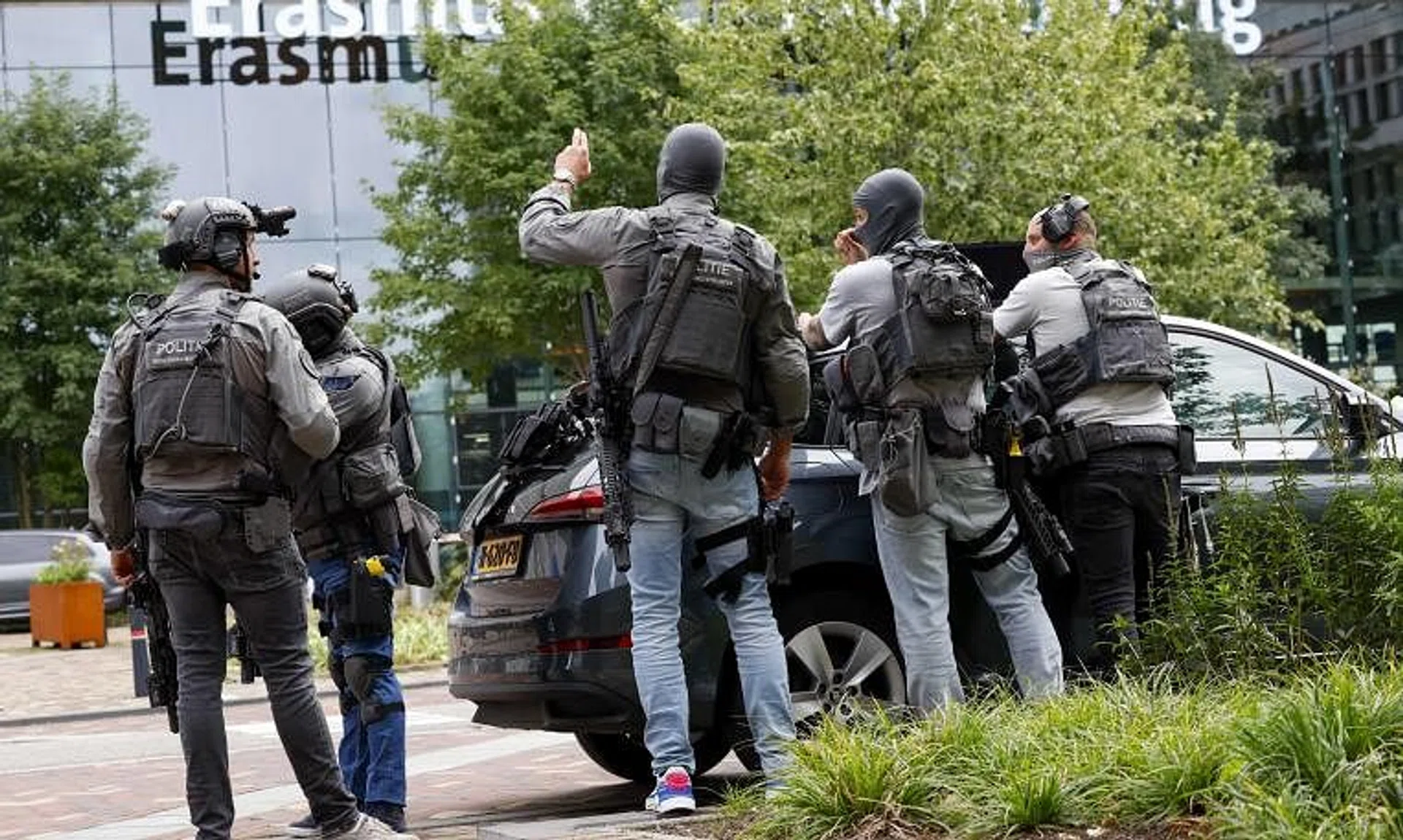 Police in body armour moved in as people were evacuated.