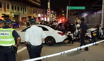 Driver and 2 passengers who ditch car and flee from Geylang roadblock at large