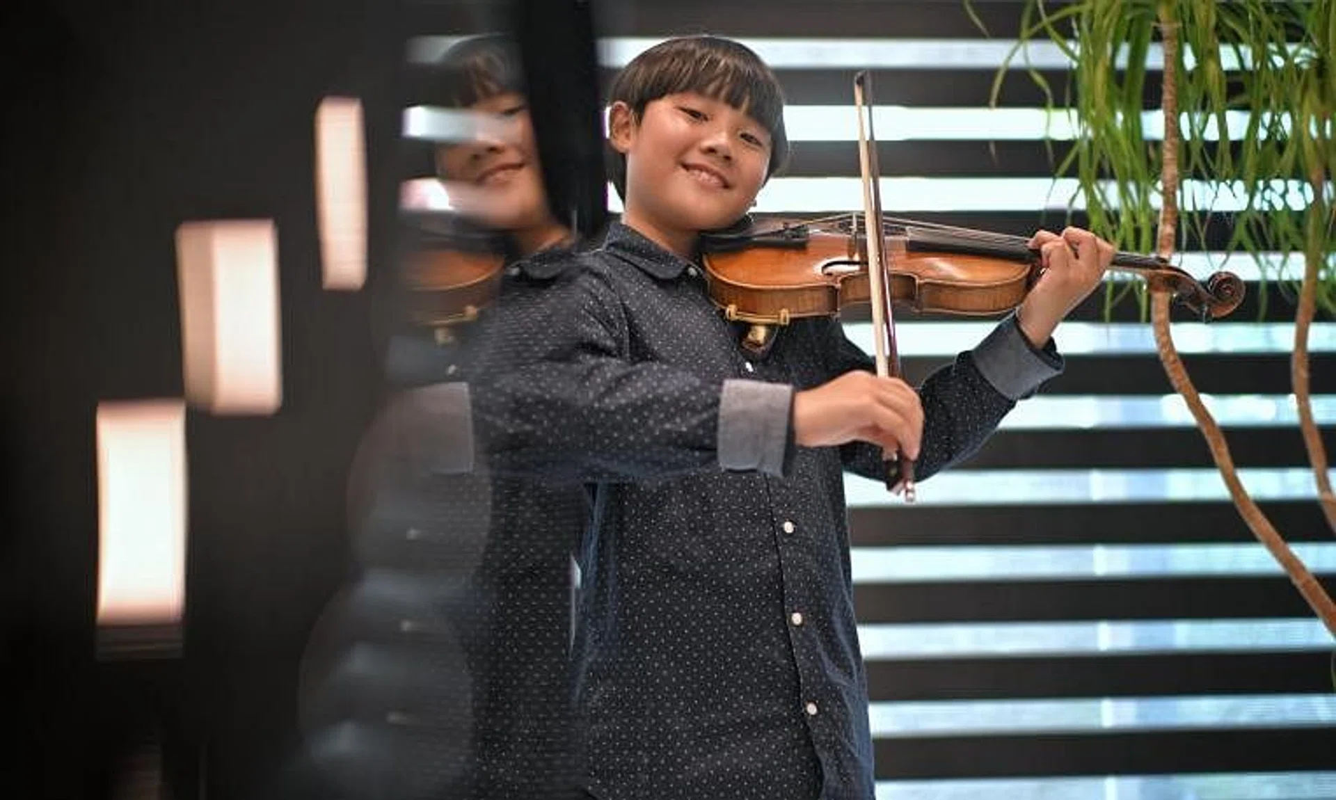 Travis Wong, 9, was named the “absolute” - or overall - winner of the 31st Andrea Postacchini International Violin Competition in Fermo, in central Italy, 