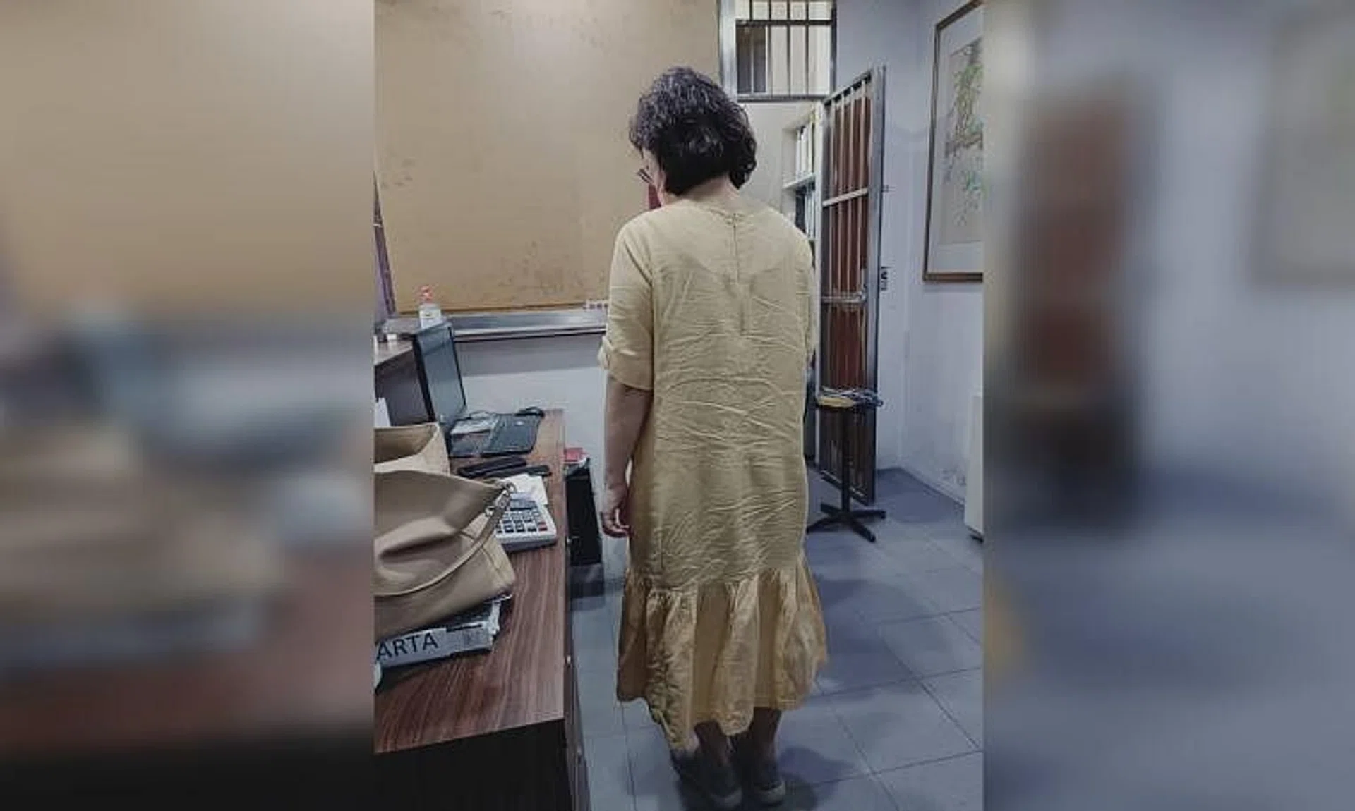 Ms Tan said she was wearing a pastel-yellow dress that extended to her calves as well as covered shoes.