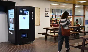 Free debit cards now a tap away with Revolut vending machine at NUS