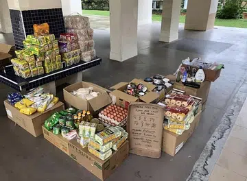 Small family project Unmanned Free Food Pantry gets bigger, better
