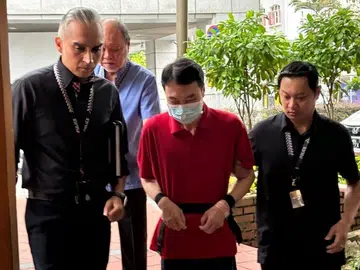 Man accused of killing woman at Maxwell taken to crime scene