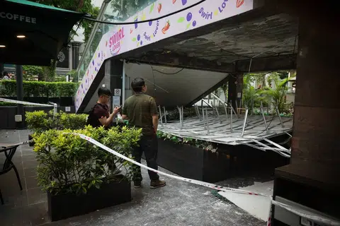 A police cordon had been put up around a collapsed structure at Liat Towers in Orchard Road. Police officers were seen walking around the area.
