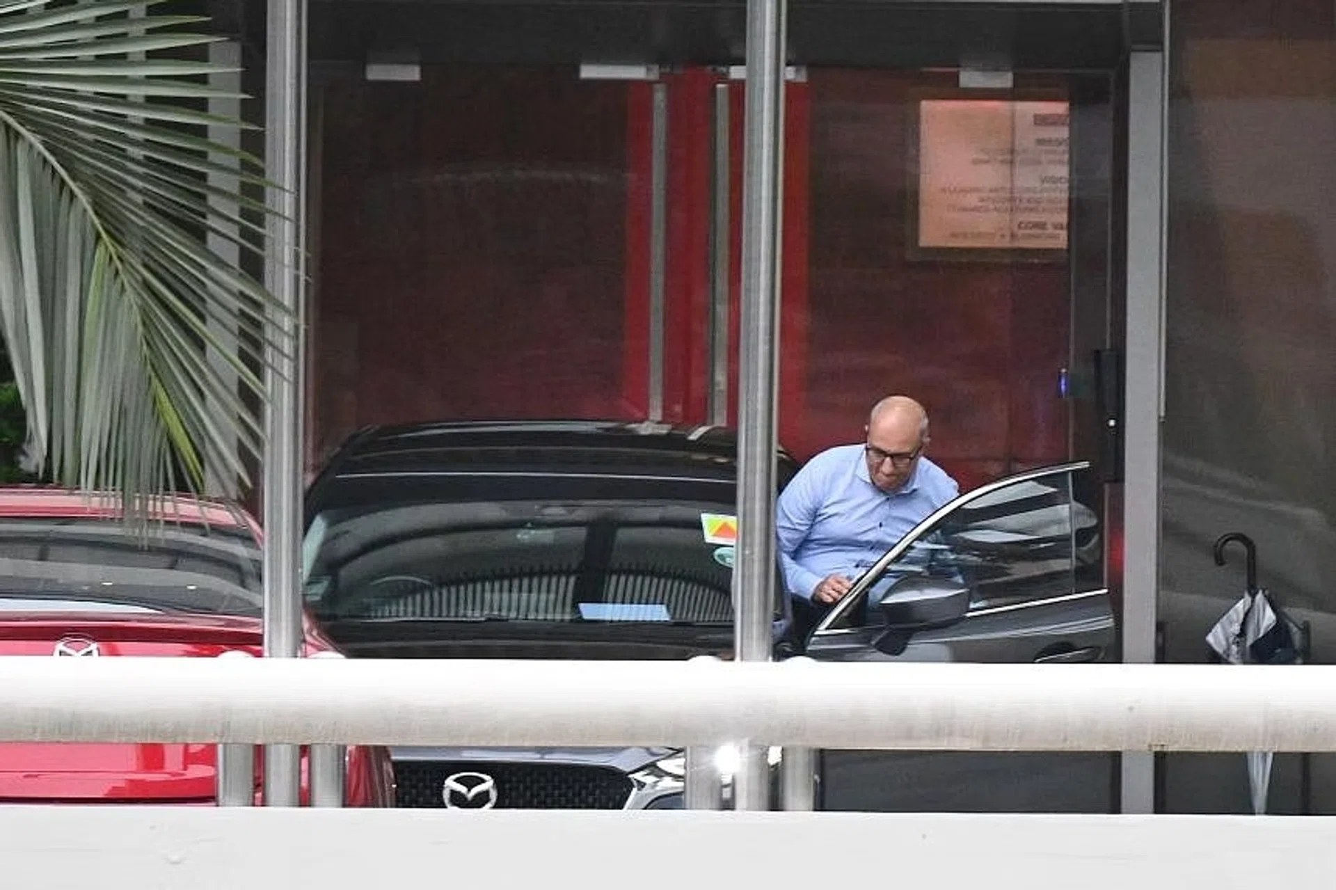Transport Minister S. Iswaran leaving the CPIB at around 6.50pm on July 19. The online article had alleged that PM Lee Hsien Loong and DPM Lawrence Wong did not disclose the fact of Mr Iswaran’s arrest because it was politically embarrassing. ST PHOTO: DESMOND WEE